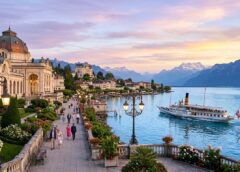 Marginal de Montreux ao pôr do sol com o Casino Barrière, um barco no Lago Lemano e os Alpes ao fundo